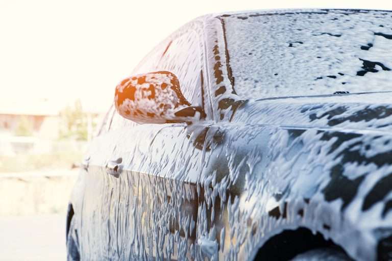 car after a car wash with soap suds